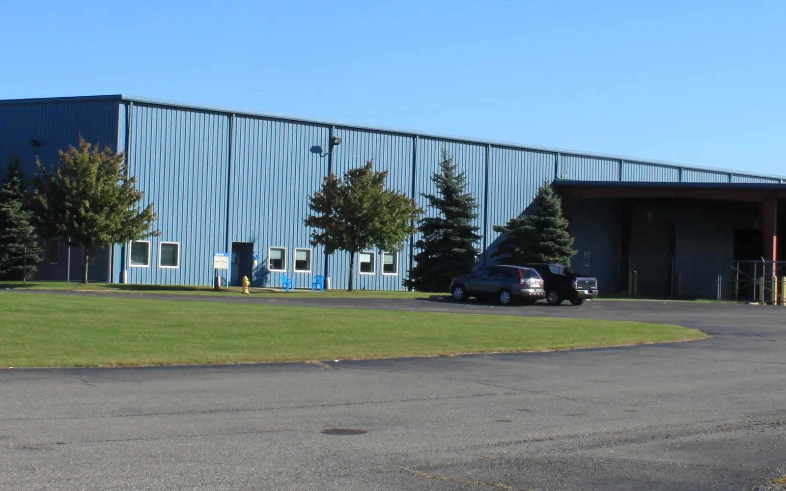 Industrial warehouse facility with exterior loading area and modern storage infrastructure