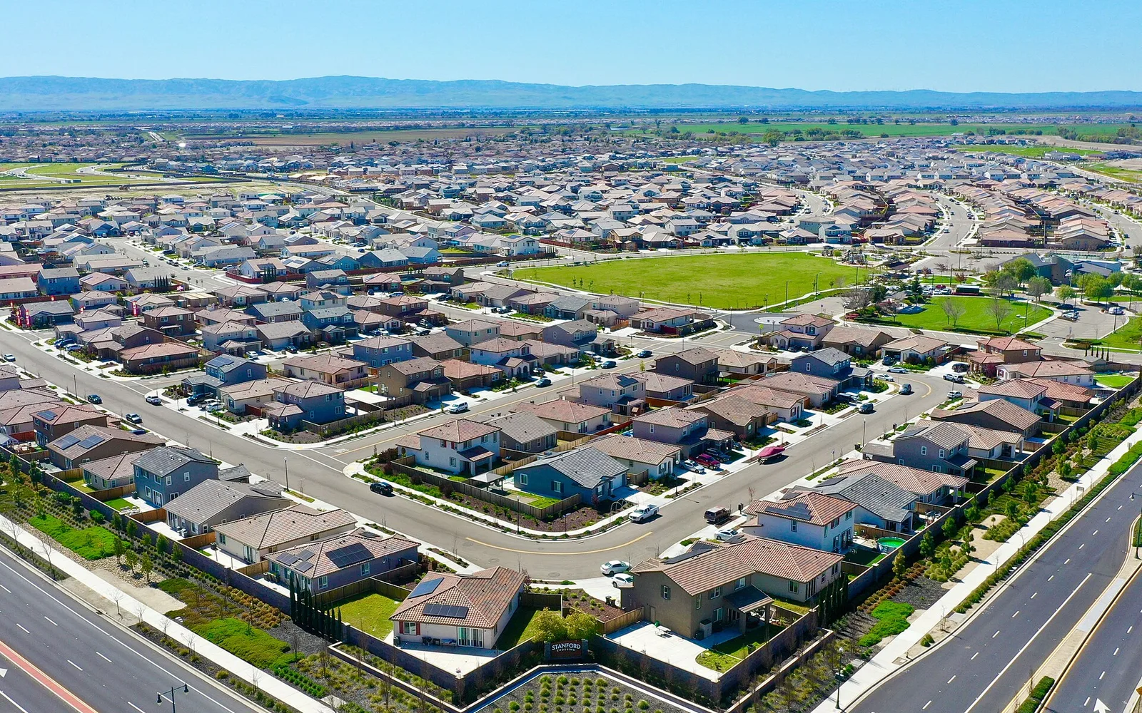 Master planned community development in Lathrop showing new residential and commercial construction